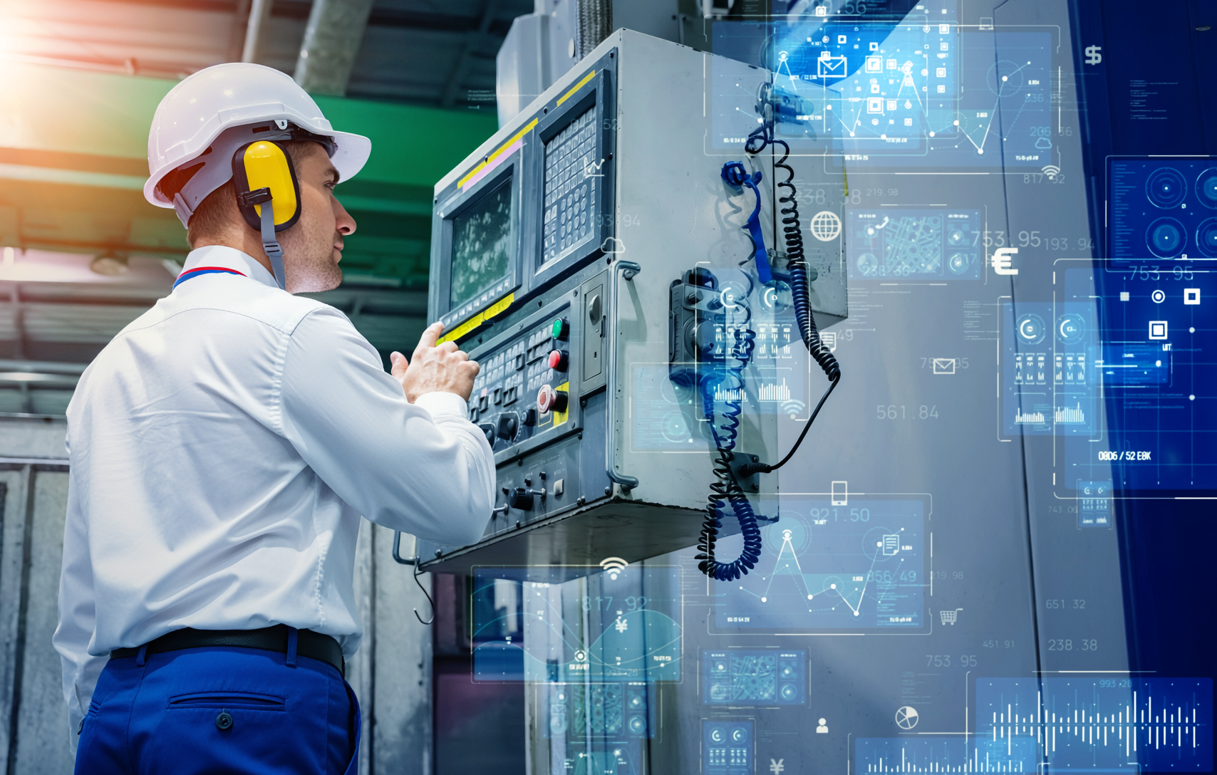 End-to-end automation solutions supporting industrial equipment operation, featuring operator interaction with an integrated control system.